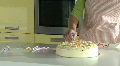 Mcu Pan Of A Woman Putting Candles On A Cake