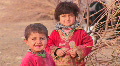 Two Iranian Children In A Rural Location.