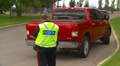 Crime And Justice, Police Writing Speeding Ticket, #4 To Red Pickup Driver