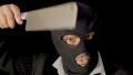 Masked Criminal Showing Chopper Knife Close Up