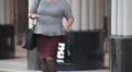 Overweight Woman Walking