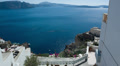 Santorini Tilt Up From Sparkling Sea To White-Washed Buildings