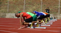 Sportsmen Run On Track. Race. Runners. Athletes. Starting Line. Olympic