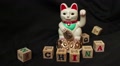 Lucky Asian Cat - Macro Dolly Past Waving Japanese Chinese Cat