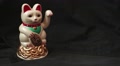 Lucky Asian Waving Cat - Dolly Left With Cat On Screen Left (Oblique)