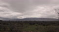 4k Uhd Gloomy Gray Winter Clouds Hang On Mountain Wide Time Lapse