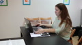 Freelance Woman Working In A Coworking Studio, Browsing Internet With Laptop