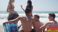 Young Hip Interracial Group Of Friends Enjoying Spring Break On Beach