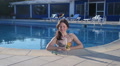 Beautiful Single Woman Enjoying Relax, Drinking In Swimming Pool