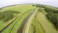 Aerial Grand Prix High Speed Racing Drone Following Cycling Path And Road 4k