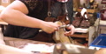 Bespoke Shoemaker Assembling Leather Pieces Together To Make Shoe