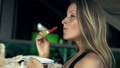 Young, Pretty Woman Eating Watermelon On Sofa On Terrace Hd