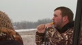 Hunter Blowing Duck Call