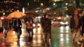 Rainy Night, People Walking, Urban Environment