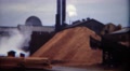 1949: Industrial Lumber Mill Factory Wood Dust Processing Smokestack Waste.