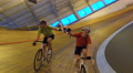 4k Action Tracking Shot Of Competitive Cyclists On Racing Track In Velodrome