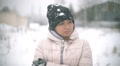 Asian Girl Shivering From The Cold In Winter During Snowfall Slowmotion