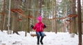 Girl Swings In Monkey Park With Rope Path In Winter Forest