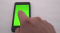 Hand Touch Phone On Green Screen