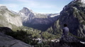 Young Man Sitting And Looking At Yosemite Valley.