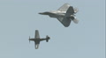 P-51 Mustang And F-22 Raptor Heritage Flight In Slow Motion