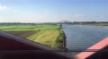 Driving With A Train Over The Ijssel River Towards The City Zwolle