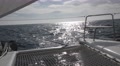 Pov Shot On Catamaran As It Cuts Through Waves Under Full Sail