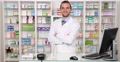 Confident Young Pharmacist Man Smile Drugstore Presentation Optimistic Druggist