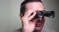 4k Young Man Using Vintage Binocular Inside Studio Shot