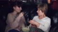 4k Authentic Shot Of A Girl With Her Mum Talking And Eating Popcorn