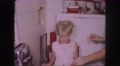 1958: A Mother Teaching Her Daughter How To Cook Eggs By The First Time