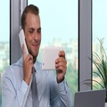 Happy Business Man Talk Landline Phone Positive Answer And Using Tablet Office