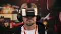 Man Playing With Homido Virtual Reality Headset On Robotics Expo In Moscow