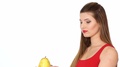 Woman With Red Lips Holding Juicy Pear And Smilin