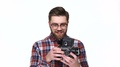 Man Holding Retro Camera And Showing Thumbs Up Gesture