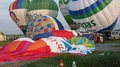 Hot Air Balloon Crew Inflating A Balloon At Saga International Balloon Fiesta
