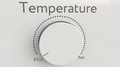Turning White Hi-Tech Knob With Temperature Inscription From Minimum To Maximum