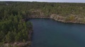 Flying Over Lake In Quarry. Aerial View