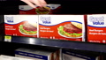 Woman Buying Great Value Beef Burgers Inside Walmart Store