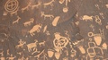 Tilt Down Shot Of Ancient American Indian Drawings On Newspaper Rock In Utah