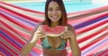 Pretty Young Woman Holding Eaten Watermelon