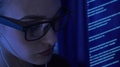 Young Beautiful Girl In Glasses Listening Music And Working With Computer