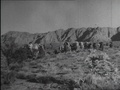 1940s: Wild West Movie: Covered Wagon Train, Indian Village, Cowboys On Horses