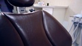 Comfortable The Dental Chair In A Medical Office. Close-Up. Steadicam Shot.