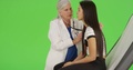 A Young Teen Girl Receives A Medical Exam On Green Screen