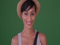 Happy Smiling Black Woman Holding Hat On Green Screen