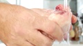 Close Up View With Hands Washing Chicken Meat In Kitchen Sink Under Water Jet