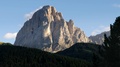 View Of The Sassolungo Peak And Chalets In The Santa Cristina Town In Dolomites