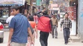 People Walking In Busy Street - Static