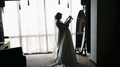 Bride Standing In Front Of The Mirror, She Is Nervous